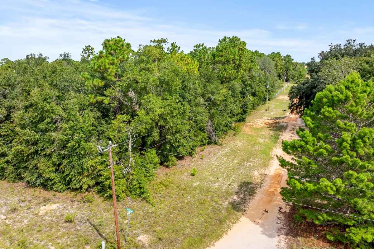 Power lines and nearby homes near land for sale in Interlachen FL