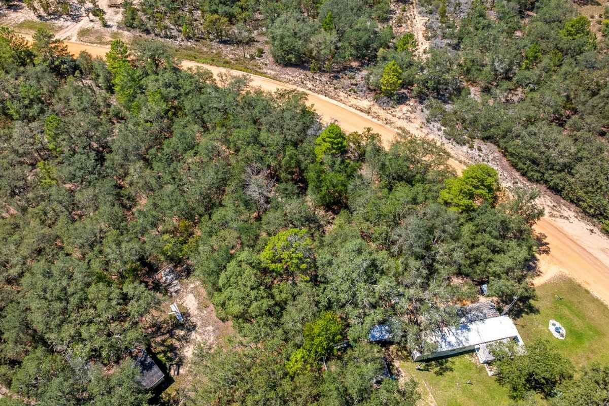 Nearby homes and power lines near land for sale in Interlachen FL